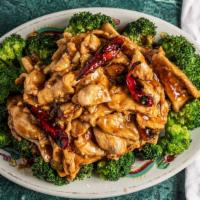 Orange Chicken (Hunan) *** See Note If First Time Ordering · Hunan style.  Sliced chicken sauteed with orange skin in delicious spicy brown sauce. Brocco...