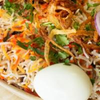 Boneless Chicken Biryani · Chicken marinated in spices and herbs and cooked with saffron flavored aromatic basmati rice...
