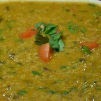 Tarka Daal · Yellow lentils cooked with Indian spices and finished with an aromatic tarka of onions, toma...