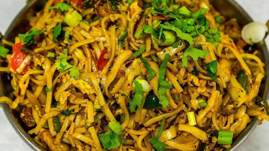 Hakka Noodles · Noodles stir fried with vegetables and served with a choice of chicken, shrimp or vegetables.