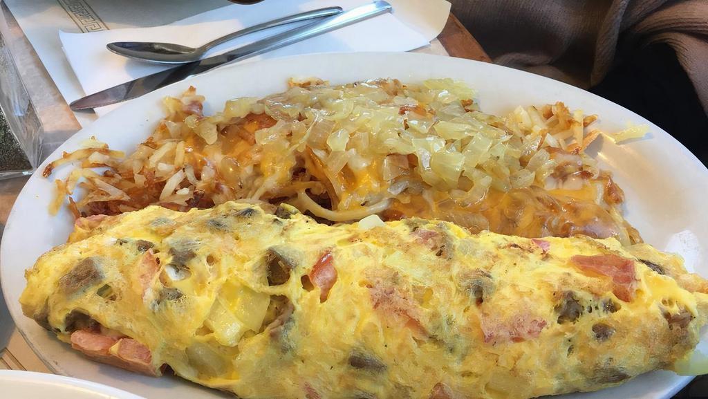 Greek Omelet · Gyro meat, onions, tomatoes and feta cheese.