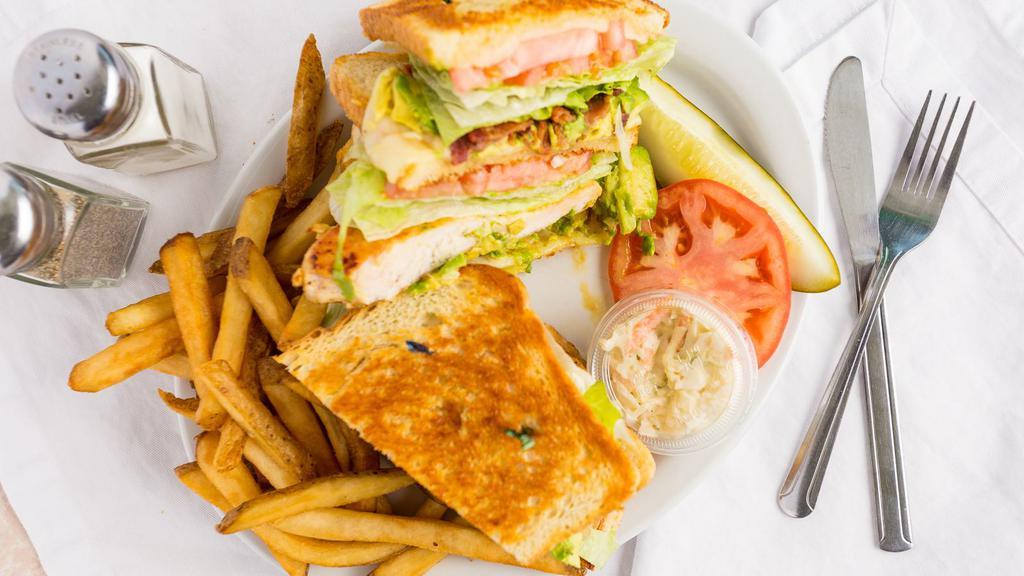 Chicken Avocado Club · Avocado, chicken breast, bacon and Swiss cheese served on toasted sourdough bread.