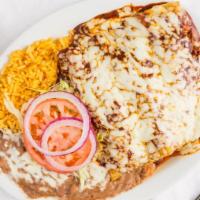 Enchiladas · Fresh corn tortillas stuffed with your choice of chicken or beef topped with our own enchila...