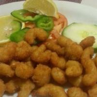Shrimp In A Basket · Mounds of bay shrimp, breaded and deep fried to crispy perfection.