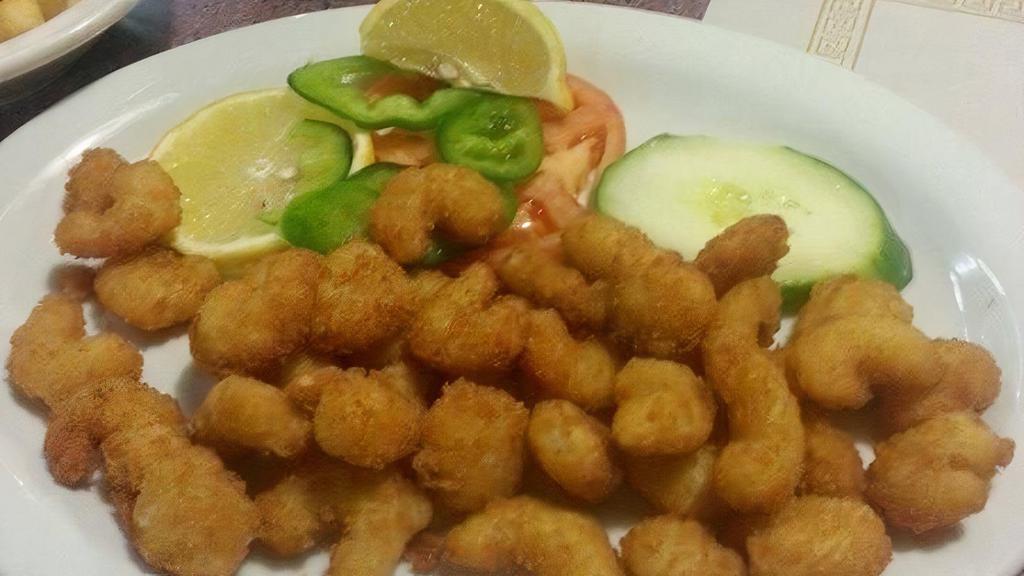 Shrimp In A Basket · Mounds of bay shrimp, breaded and deep fried to crispy perfection.