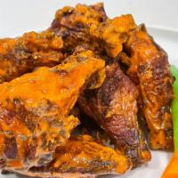 Golden Chicken Wings · Brined and Fried Bone-In Chicken Wings. Choice of Sauce, Celery and Carrots.