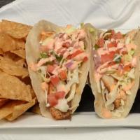 Baja Fish Tacos · Flash-fried or grilled cod, crisp cabbage, fresh pico de gallo, johnny sauce, lime, chips, s...