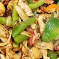 Fajitas · Grilled chicken or steak with sauteed bell peppers, onions and tomato
