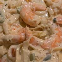 Seafood Alfredo · SHRIMP AND CRAB IN A CREAMY ALFREDO SAUCE OVER NOODLES