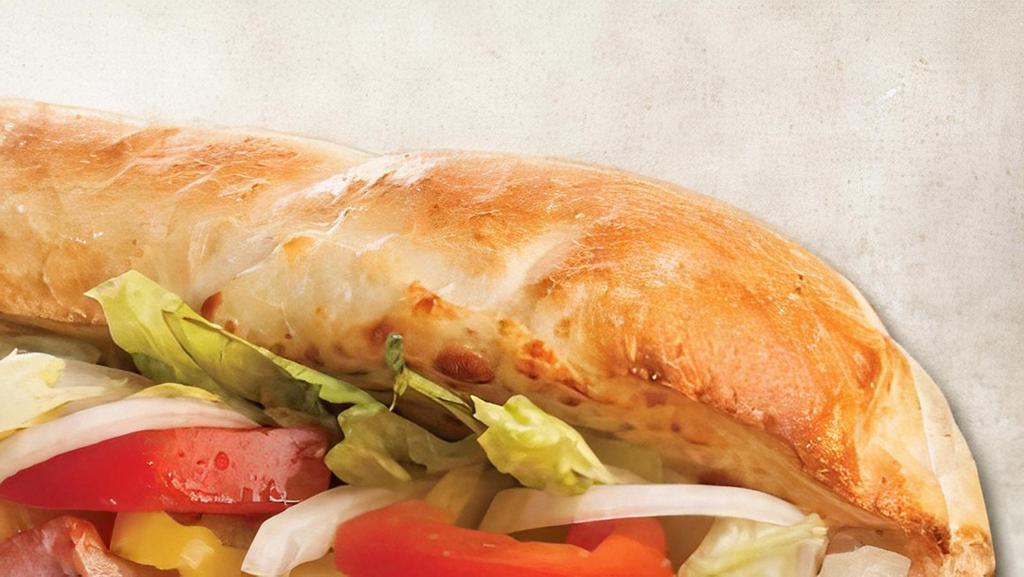 Grilled Chicken Sub · Grilled chicken, onions, lettuce, tomatoes, provolone cheese, and Italian dressing.