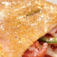 Chicken Supreme Calzone · Chicken, onions, green peppers, black olives, tomatoes, mozzarella and cheddar cheese. Oven-...