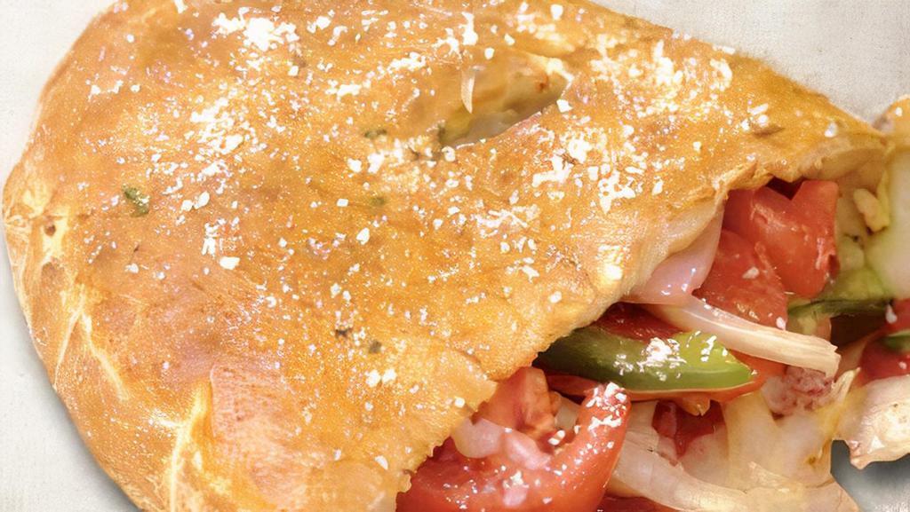 Chicken Supreme Calzone · Chicken, onions, green peppers, black olives, tomatoes, mozzarella and cheddar cheese. Oven-baked fold-over topped with garlic butter and Parmesan cheese.