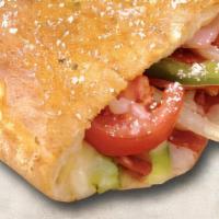 Veggie Calzone · Mushrooms, onions, green peppers, green olives, black olives, tomatoes and mozzarella cheese...