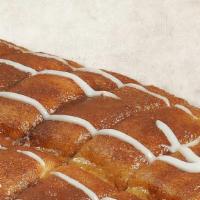 Cinnamon Sticks · Fresh bread covered with a cinnamon-butter blend. Served with a side of vanilla frosting.