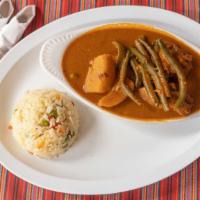 Pepian · Mayan chicken stew with potatoes, green beans and imported Guatemalan spices, served with a ...