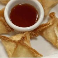 Crab Rangoon · Crispy wonton pastry filled with whipped Philadelphia cream cheese, crab stick and celery se...