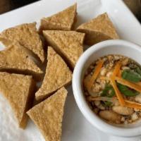 Taohu Thot  (Fried Tofu) · Fried tofu served with our unique Thai - style sweet and sour sauce and peanuts
