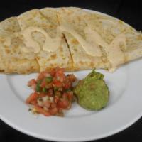 Chicken Quesadilla · Chipotle ranch drizzle, guacamole, pico de gallo.