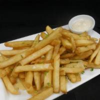 Truffle Fries · French Fries, tossed in truffle oil, shaved parmesan cheese, chive, sea salt, side of garlic...