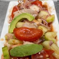 Aguachile Mixto · Fresh aguachile (shrimp marinated in lime juice), cooked shrimp, octopus, cayo de hacha (Mex...