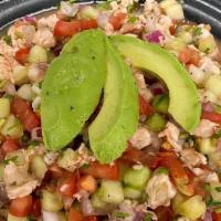 Ceviche De Camarones · Fresh shrimp marinated in lime juice mixed with cucumbers, tomatoes, red onions, cilantro an...