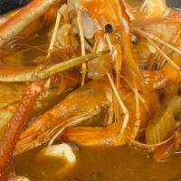 Caldo 7 Mares · Seven seas soup with shrimp, muscles, octopus, tilapia filet, and crab legs.