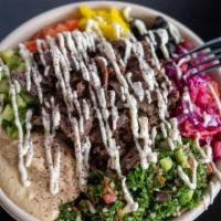 Steak Shawarma Bowl · Freshly cut Steak Shawarma with your choice of rice, topped off with your favorite toppings ...