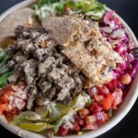 Half & Half Shawarma Bowl · Freshly cut Chicken / Steak Shawarma with your choice of rice, topped off with your favorite...