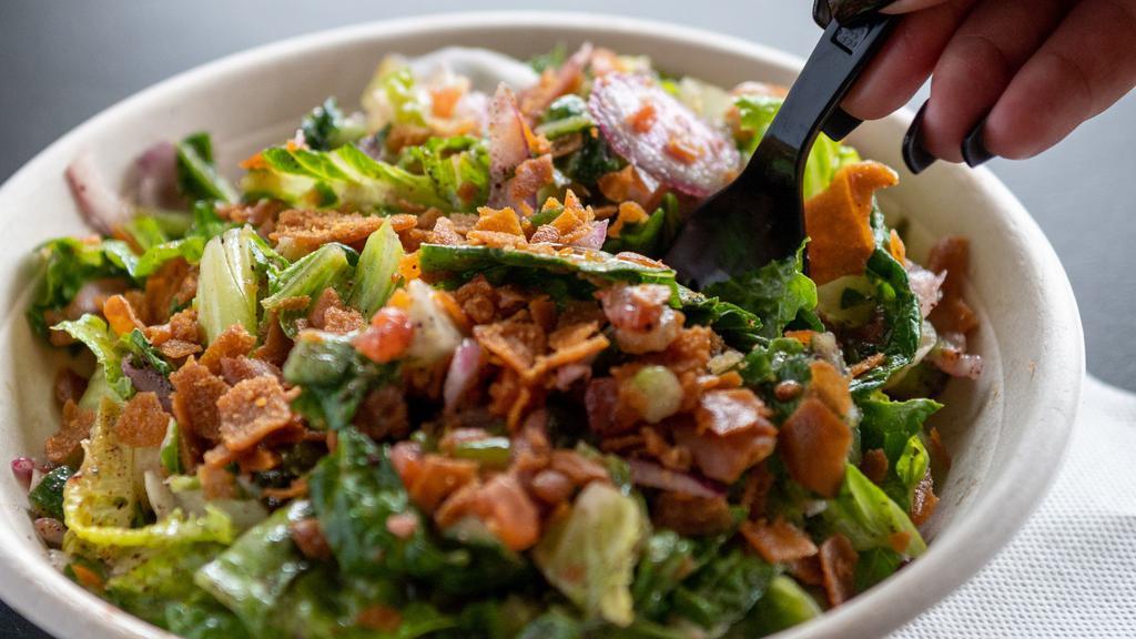 Lettuce Salad · Freshly cut romaine lettuce, topped off with your favorite toppings  and homemade sauces with an optional choice of protein
