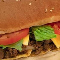 Taco Sub (Large) · Taco seasoned burger, Cheddar cheese, taco chips, onions, lettuce, tomatoes and topped with ...