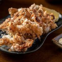 Geso Karaage · Traditional deep-fried squid tentacles.
