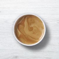 Americano  · A hot, black coffee prepared with a double-shot of espresso.