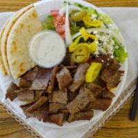 Gyros Plate · Specially seasoned beef & lamb served a top rice pilaf, and your choice of Greek or tabouli ...