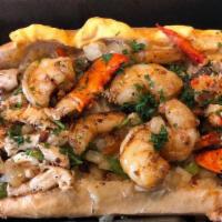 Omg 2.0 · Grilled chicken, buttered lobster, jumbo chopped shrimp, mushrooms, onions, peppers, Swiss c...