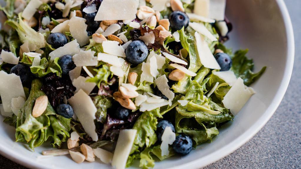 Blueberry Almond Salad (Side) · SEASONAL - Field Greens, Fresh Blueberries, Marcona Almonds, Parmesan Cheese, and House made Lemon-Ginger Vinaigrette Dressing