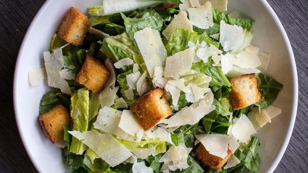 Caesar Salad (Regular) · Romaine Lettuce, Parmesan Garlic Croutons, Shaved Parmesan, Caesar Dressing