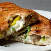 Calzone · Dewey’s Calzone comes with Mozzarella and Ricotta and a side of Red Sauce, with your choice ...