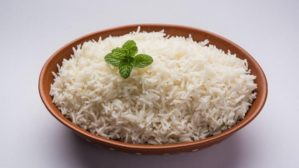 Basmati Vermicelli Rice · Long-grain aromatic rice cooked in a vegetable broth.