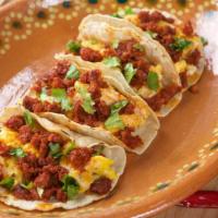 Chorizo Gringo Taco · Delicious taco made with a flour tortilla, shredded lettuce, spiced ground beef, pico de gal...