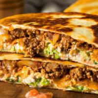 Beef Quesadilla Combo · Greek bread with a five blend cheese mix, char-grilled skirt steak mixed with Poblano pepper...