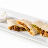 Beef Quesadilla · Greek bread with a five blend cheese mix, char-grilled skirt steak mixed with Poblano pepper...