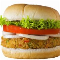 Veggie Burger · Veggie patty served on a warm, brioche bun with crispy lettuce, chopped tomato, pickles, bur...