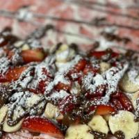 Pluto Crepe  · Strawberry or Chocolate crepe with nutella , cream cheese , strawberry , blueberry , cake cr...