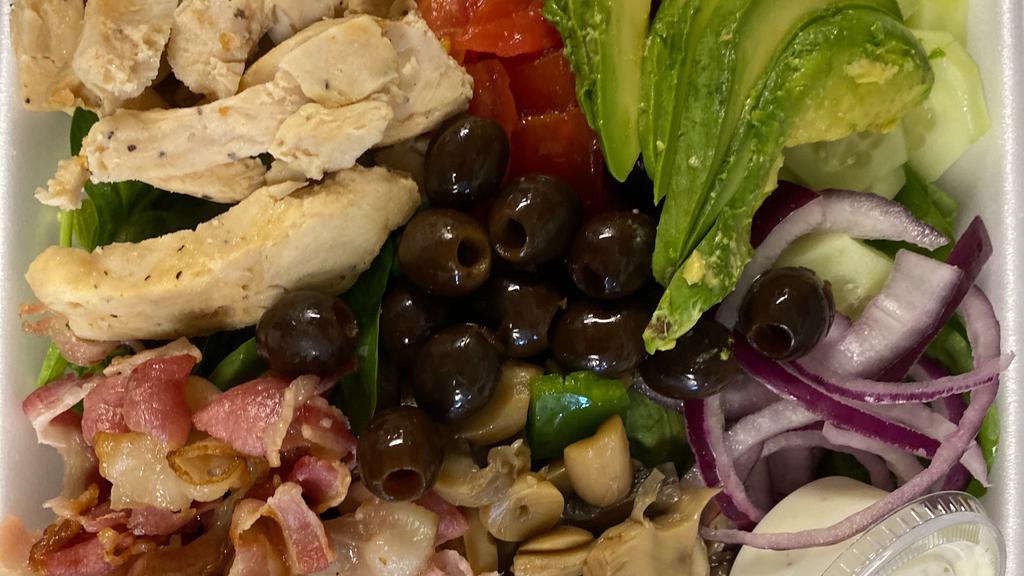 East Sphere Salad · Choice of spinach or lettuce, tomatoes, red onion, feta cheese,  olives, cucumber,  Chicken , and Greek dressing.