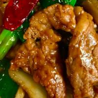 Mongolian Beef (Large) · Spicy. Sliced beef sautéed with white onions and green onions in dried peppers hot sauce. Se...