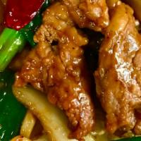 Mongolian Beef (Medium) · Spicy. Sliced beef sautéed with white onions and green onions in dried peppers hot sauce. Se...