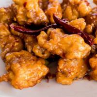 Orange Chicken · Spicy. Lightly battered sliced chicken marinated and sautéed in special hot sauce. Served wi...