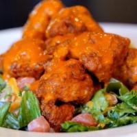 Buffalo Chicken Salad · Crispy or grilled chicken, Romaine lettuce, tomatoes, Buffalo sauce, shredded cheddar cheese...