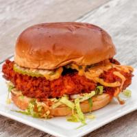 Hot Chicken Sandwich · Dry rub mayo, pickles, shredded lettuce, 6 oz. Fried chicken breast. Available grilled.
