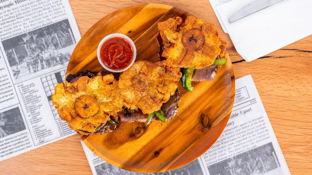 Tostone Sliders Sandwich · 3 crispy fried pressed Plantains. Served with your choice of smoked meat chicken, brisket, pulled pork, caramelized onions, and bell peppers.
